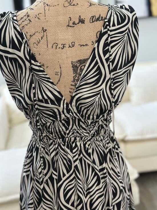 Indulge in Style Black and White Leaf Print Smocked Maxi Dress - Picture 5 of 7